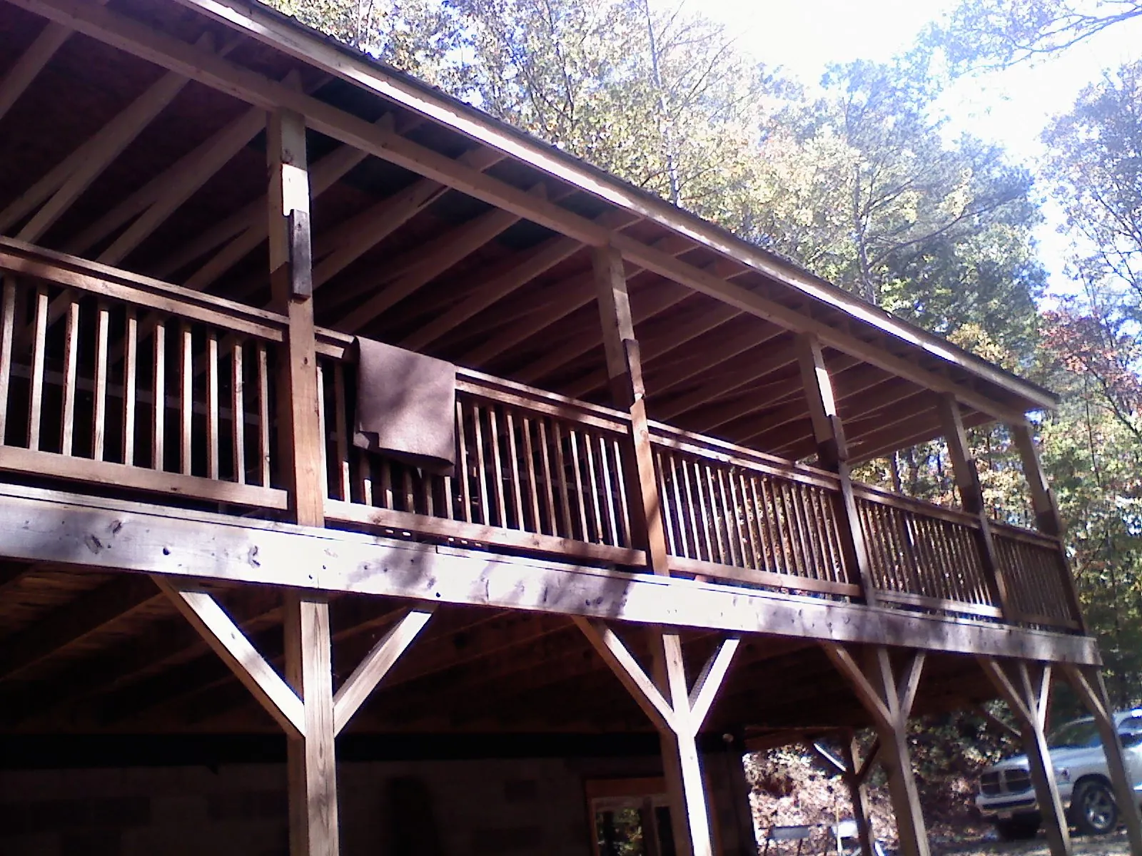 Timber framing under a new elevated porch and deck — Roof Leak Repair in Sand Lake by Roofing Brothers